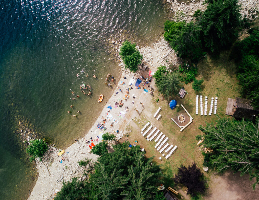 Grey Creek Hall Beach Party Wedding Drone Shot Captured by Dustin Lalik
