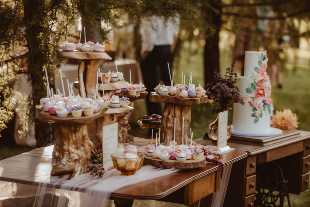 Towering dessert display by Starbird Bakehouse at a private property wedding in Winlaw. 